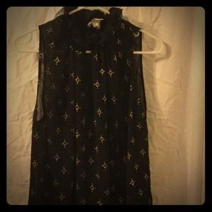 Black sheer blouse with ruffle collar and gold